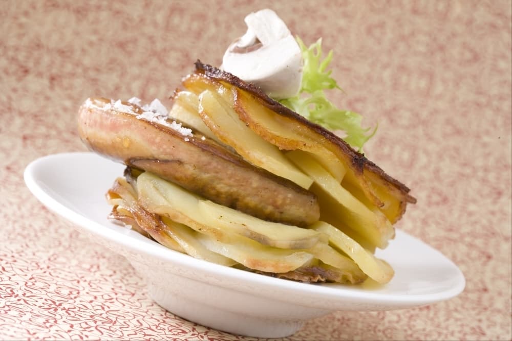 Pomme Anna au foie gras et champignons crus