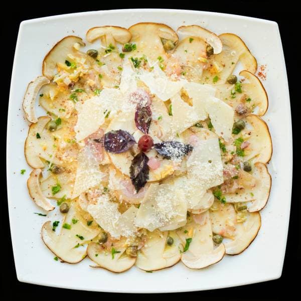 Carpaccio de Eryngii, sauce vierge aux agrumes et copeaux d’asperges vertes