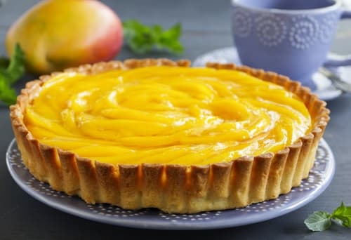 Tatin de mangue au citron vert, coulis fruits de la passion