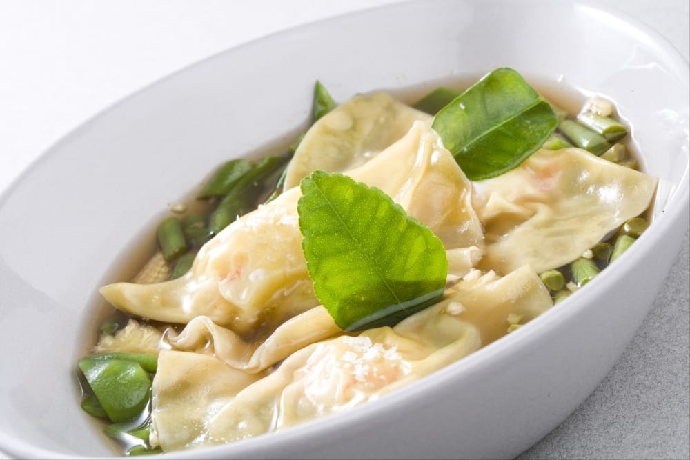 Recette Raviole de langoustine au bouillon de gingembre
