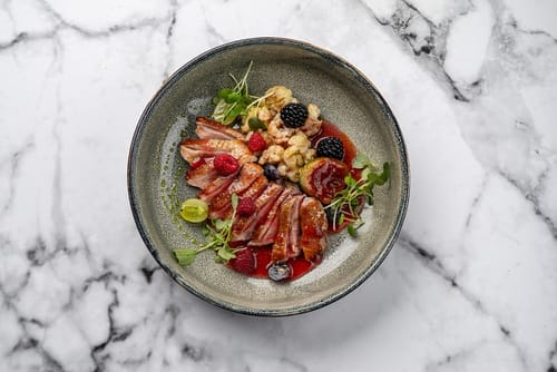 Recette Magret de canard aux framboises, poêlée de légumes printaniers